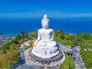Big Buddha statue on a hilltop with panoramic views and serene surroundings in Phuket.
