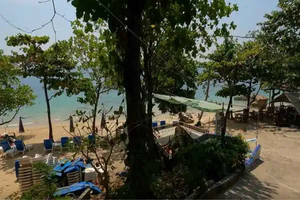 Secluded Ao Sane Beach with rocky shoreline and clear water, offering a tranquil getaway.