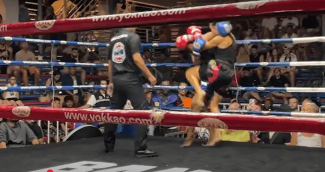 Muay Thai fighters in the ring at Bangla Boxing Stadium.