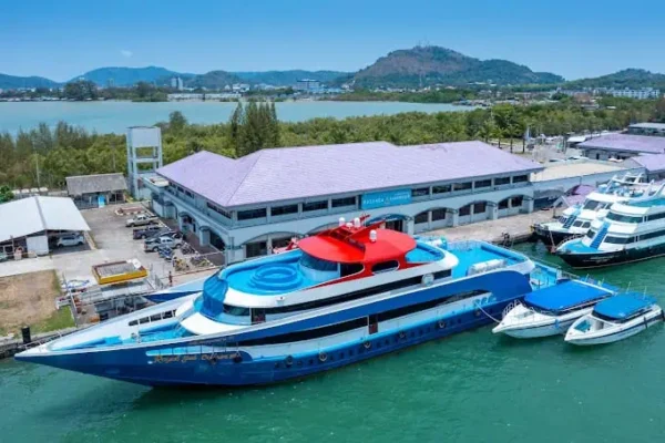 Ferry from Phuket to Phi Phi Island crossing the Andaman Sea with passengers on deck
