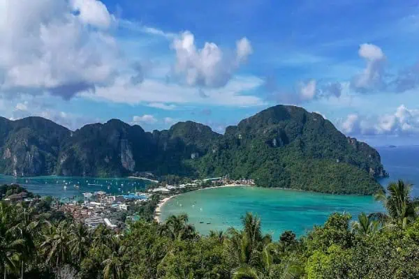 Aerial view of two beautiful beaches on Phi Phi Don, separated by a narrow strip of land, showcasing the island’s natural beauty.