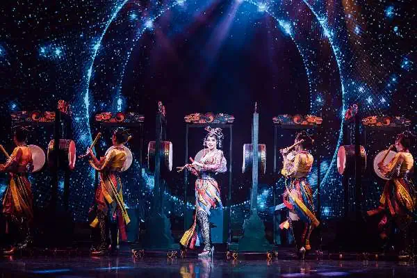 A vibrant Chinese opera performance on stage at the Simon Cabaret Show in Phuket, showcasing performers in traditional costumes and elaborate makeup, demonstrating the rich cultural heritage and artistic talent of Thailand’s entertainment scene.