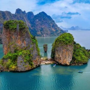 Scenic view of Phang Nga, Thailand, featuring stunning limestone cliffs and turquoise waters, reminiscent of James Bond films.