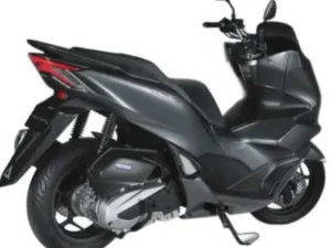 sleek anthracite Honda PCX 160 scooter displayed prominently, showcasing its modern design and stylish features.