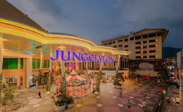 Visitors shopping indoors at Jungceylon Mall in Phuket on a rainy day.